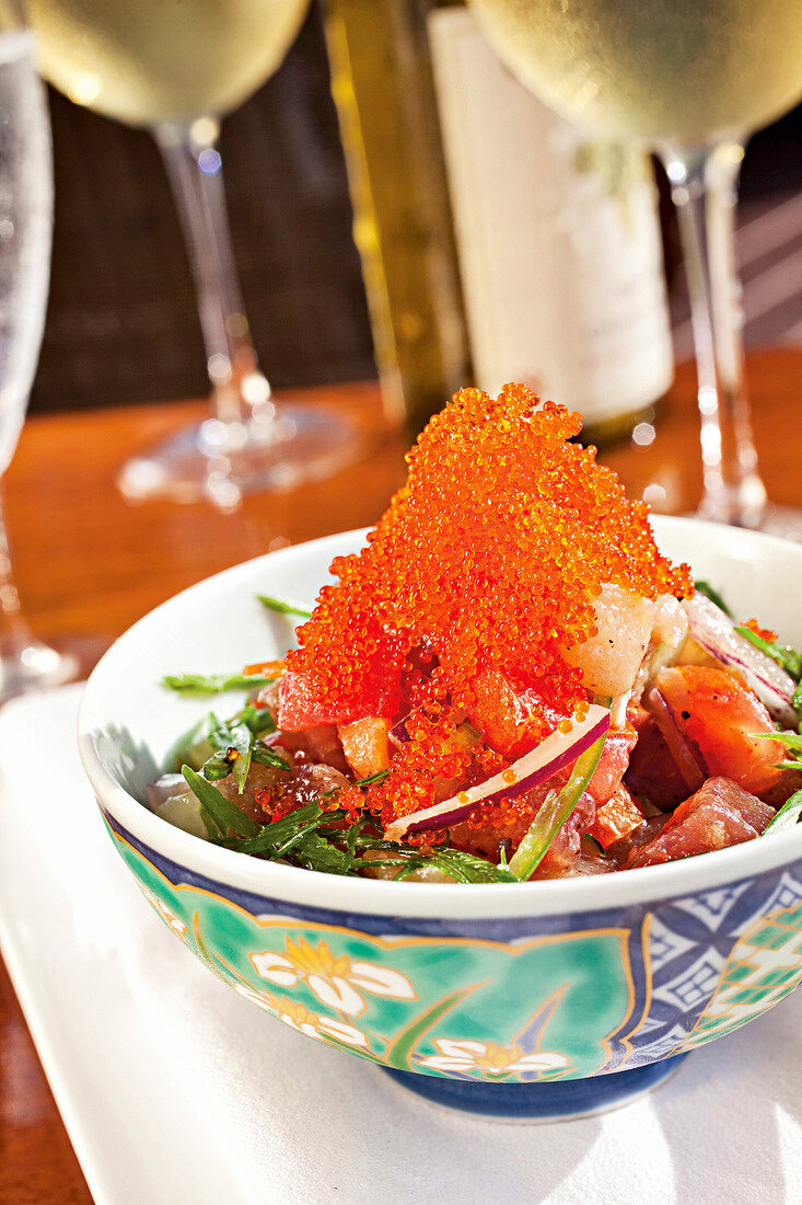 Close-up of sashimi salad with tuna and caviar in bowl