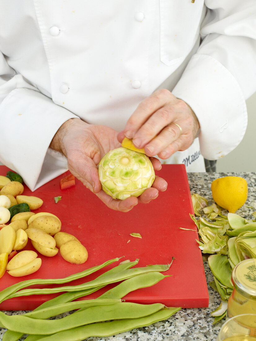 Applying lime on artichoke