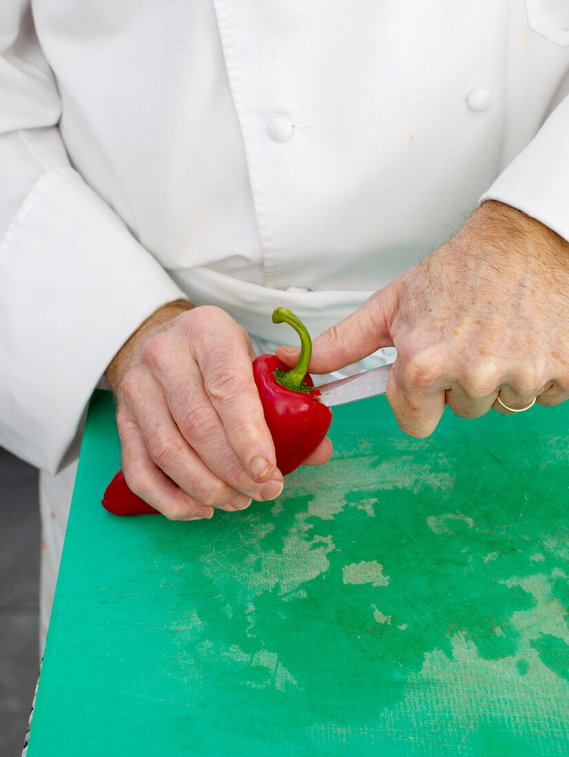 Close-up of cutting the bell pepper with knife