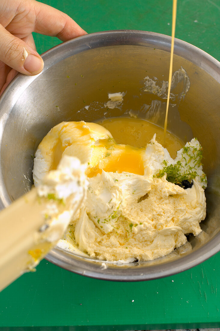 Adding egg yolk to hung curd