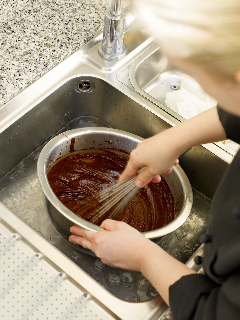 Whisking the chocolate in bowl