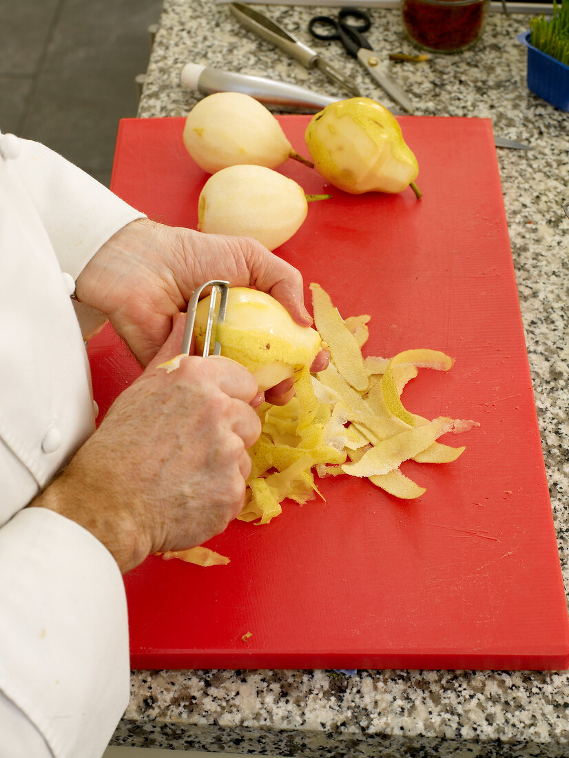 Peeling pears with peeler