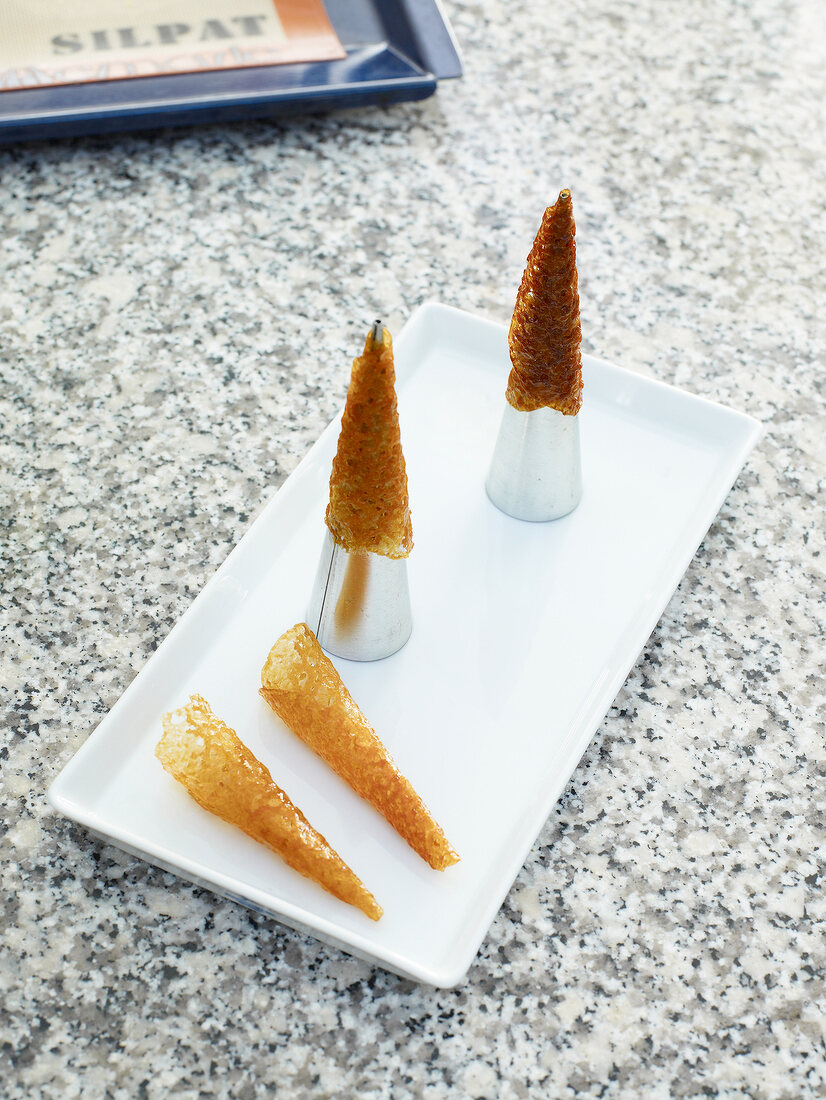 Cone shaped plate decorations on tray