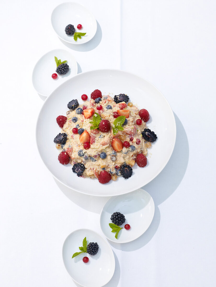 Muesli with fruits on plate