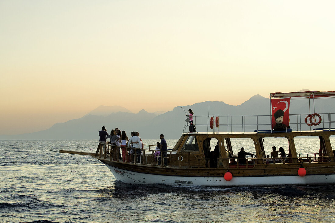 People on cruise at dusk, Antalya, Turkey