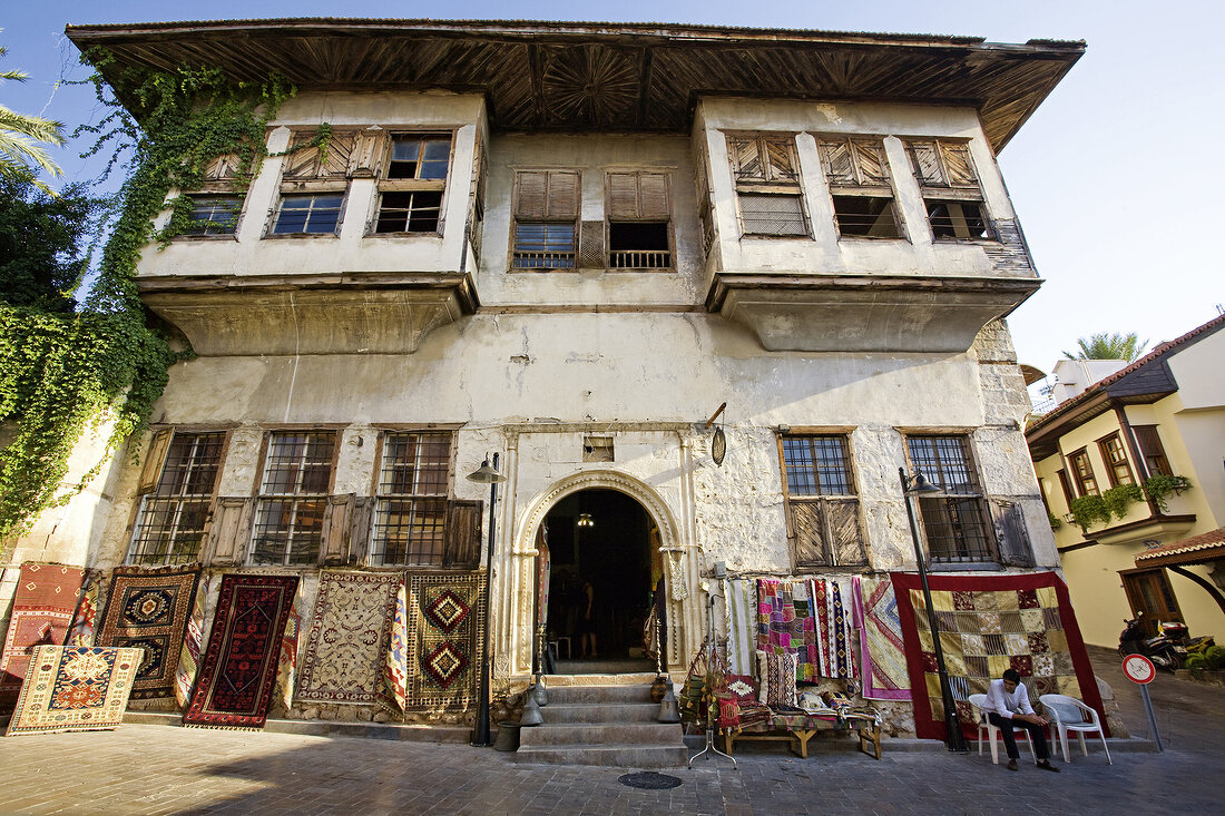 View of carpet dealer in front of Ottoman house in Antalya, Turkey