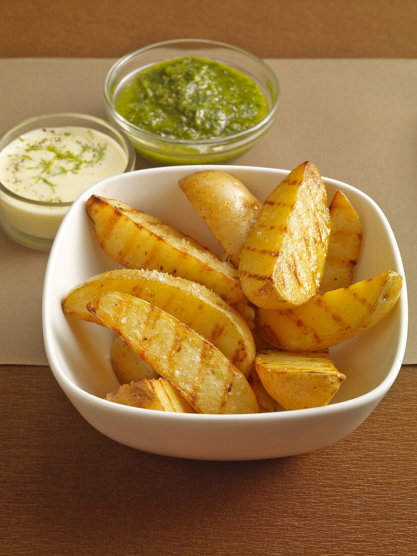 Grilled potatoes and mojo mayo in bowls