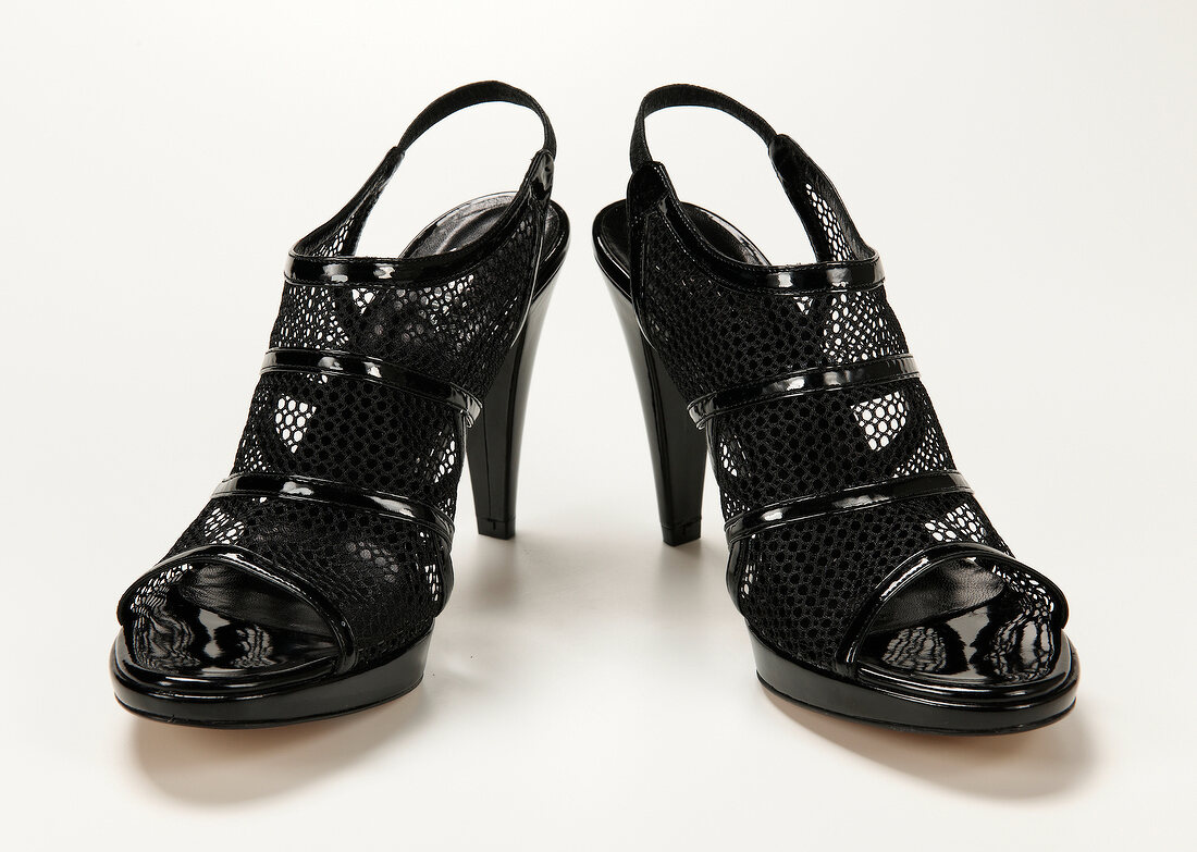 Sandals with black mesh on white background