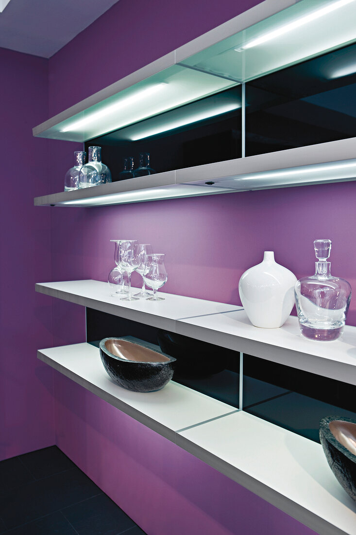 Close-up of kitchen shelves with glass jars