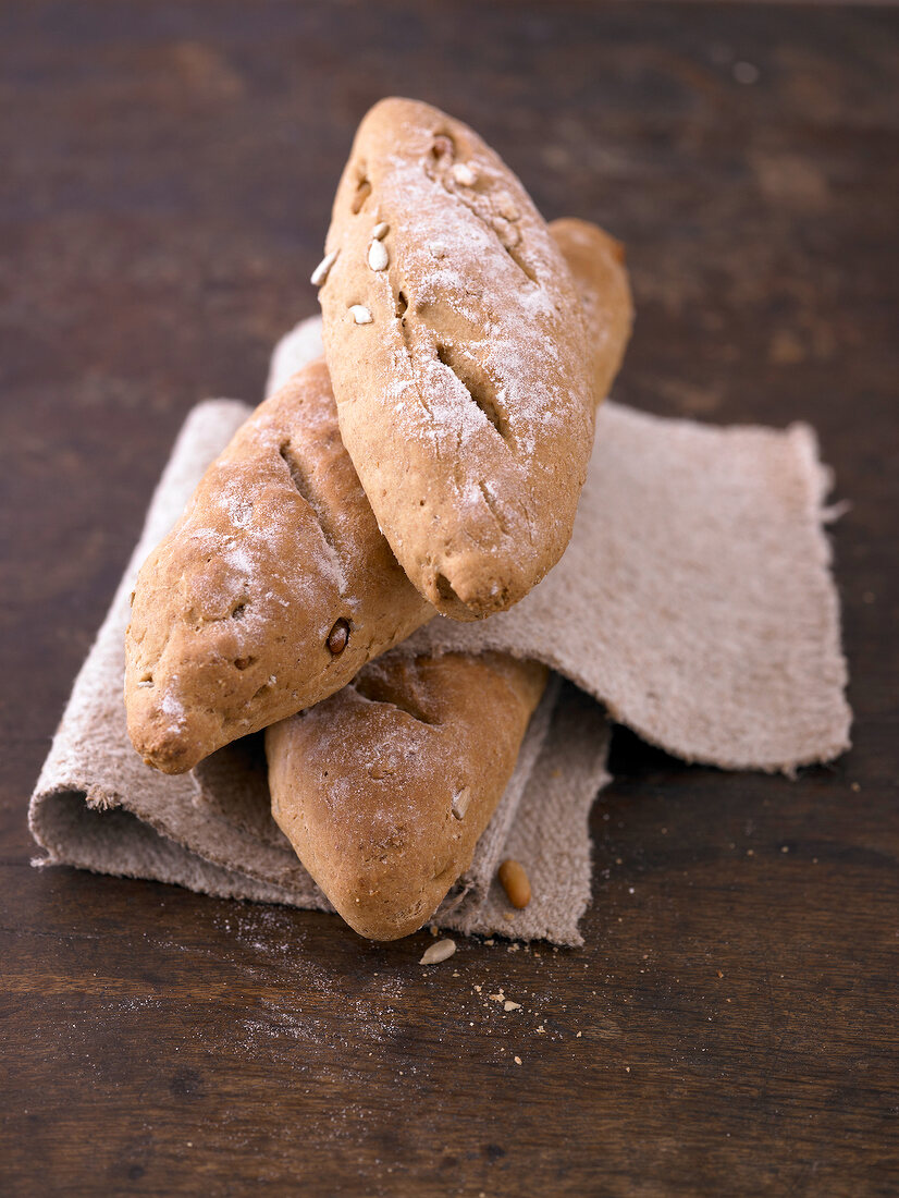 Close-up of baguette bun with sour cream