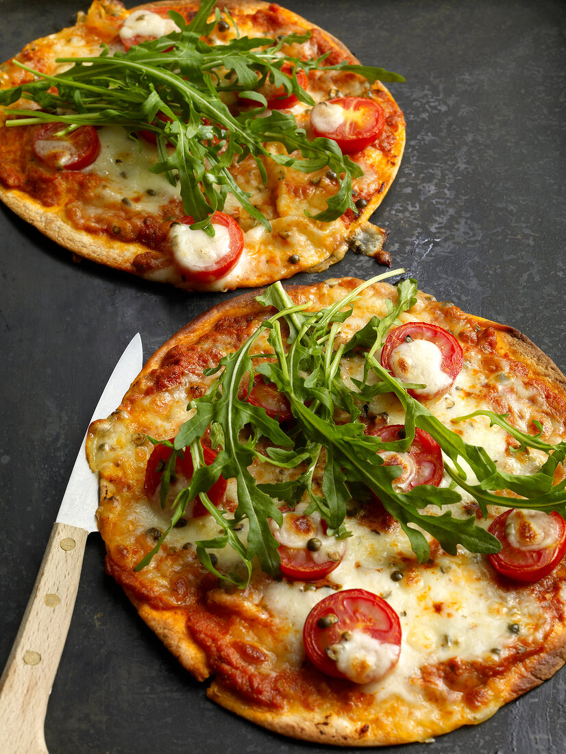 Close-up of tortilla pizza with rocket
