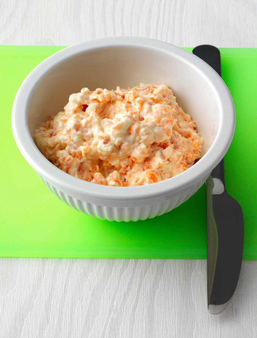 Pink salmon salad in bowl