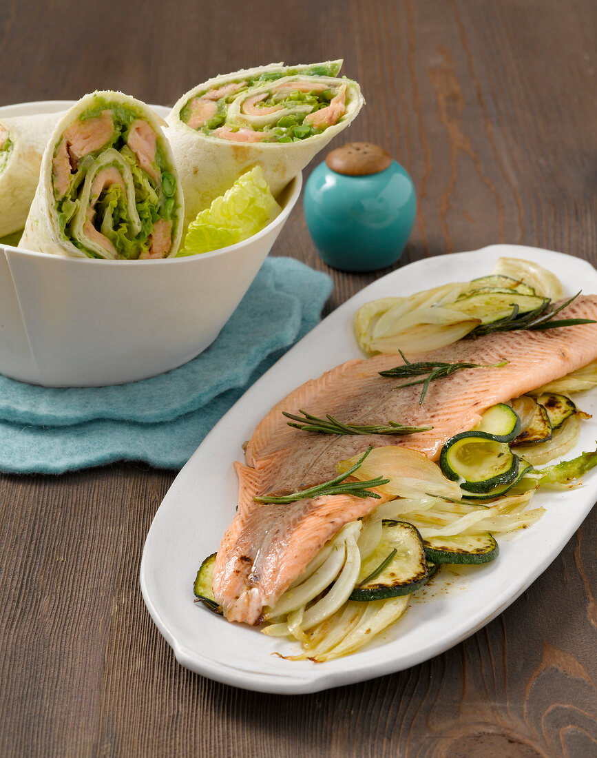 Salmon trout with fennel on plate and salmon and fennel Wrap in bowl