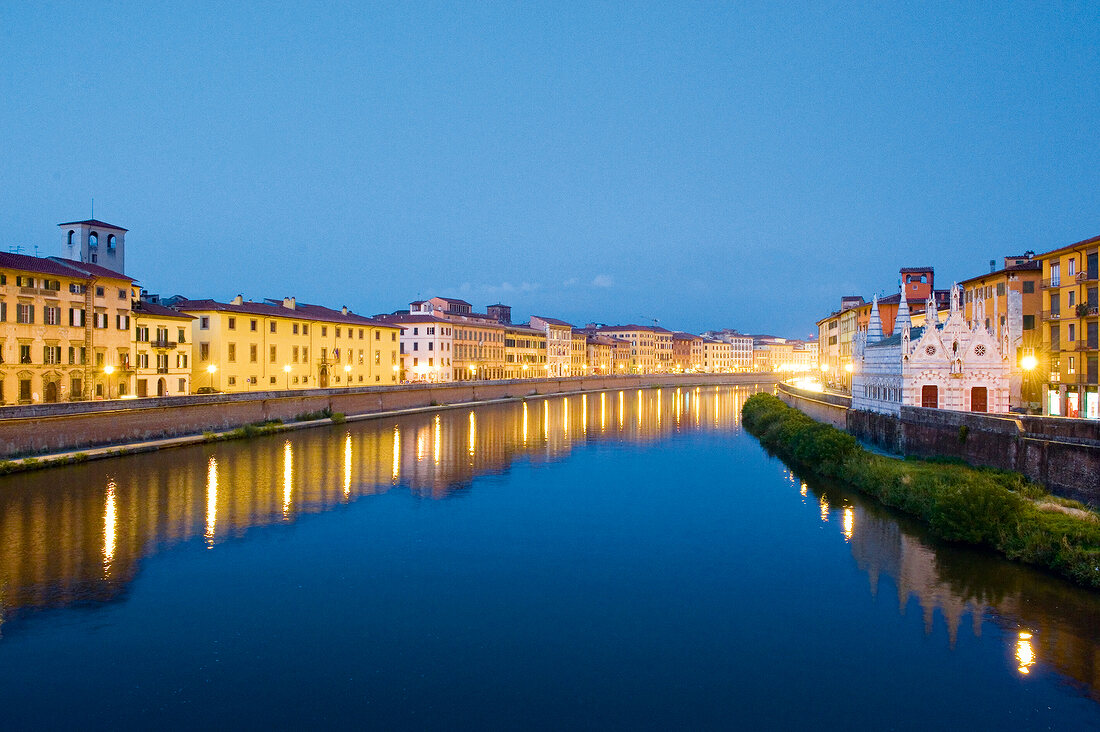 View of illuminated Santa Maria Della Spina on the Arno river, Pisa, Italy