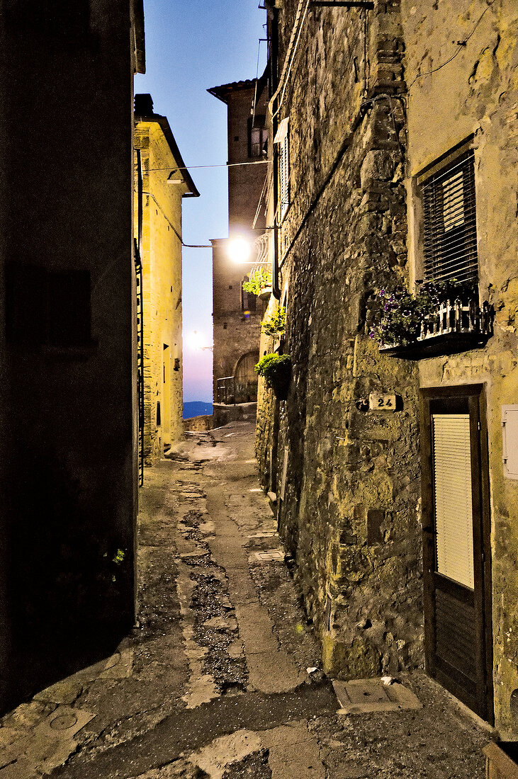 View of an alley at dusk in Volterra, Tuscany, Italy
