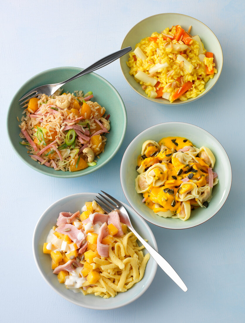 Four one-pot dishes in bowls