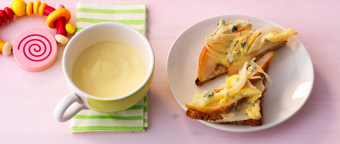 Fennel and pear porridge with toast pizzas on plate