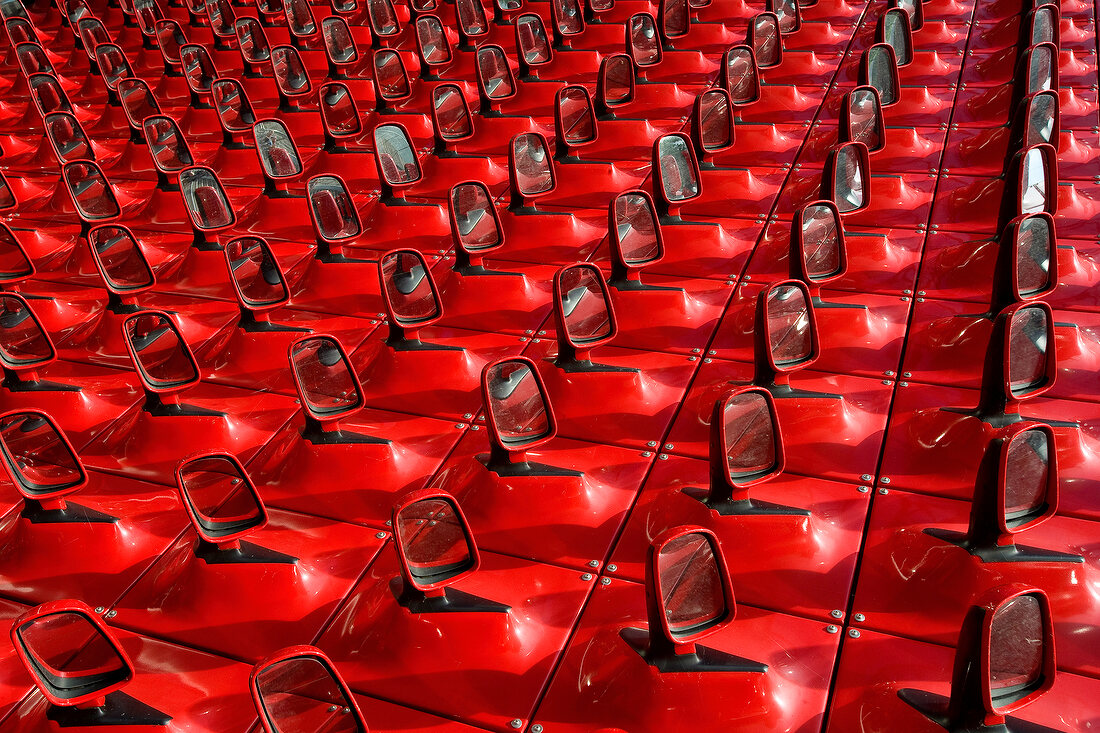 Lined up seat mirror in red, Autostadt, Wolfsburg, Germany