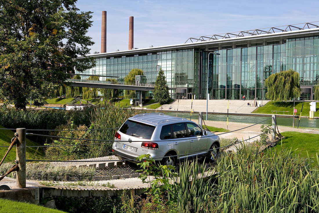 Car passing through the suspension bridge, Autostadt, Wolfsburg, Germany