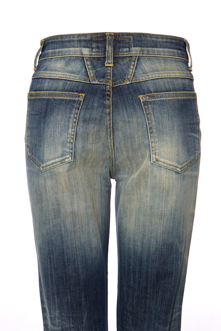 Blue pedal pusher jeans on white background