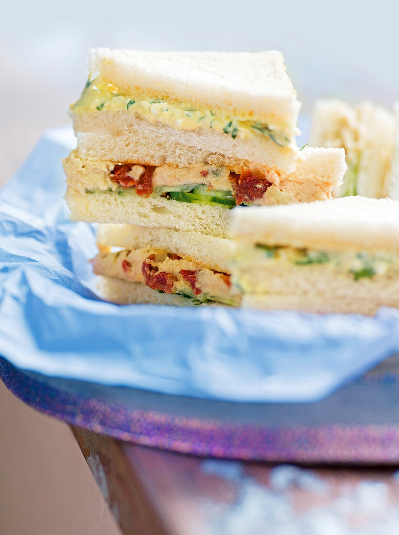 Close-up of sandwiches with egg custard and tuna cream on plate