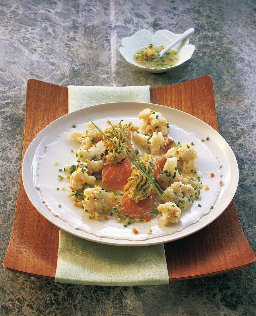 Cauliflower salad with vinaigrette chives on plate