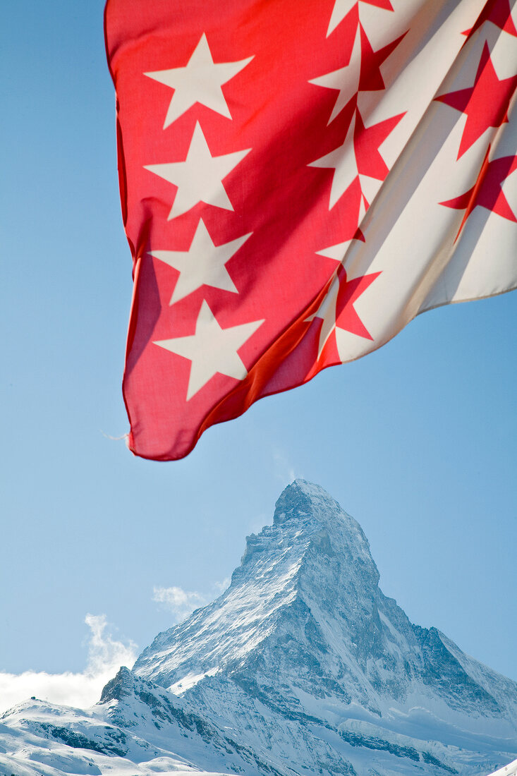 View of Matterhorn mountain and Valais flag in Switzerland