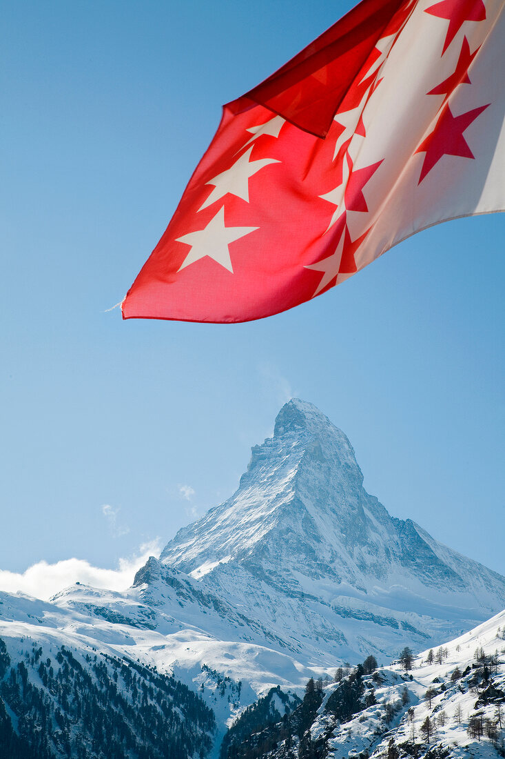 View of Matterhorn mountain and Valais flag in Switzerland