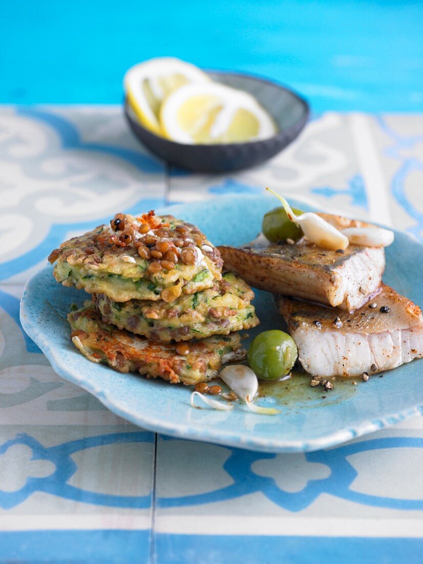 Courgette and lentil cakes with zander fillet