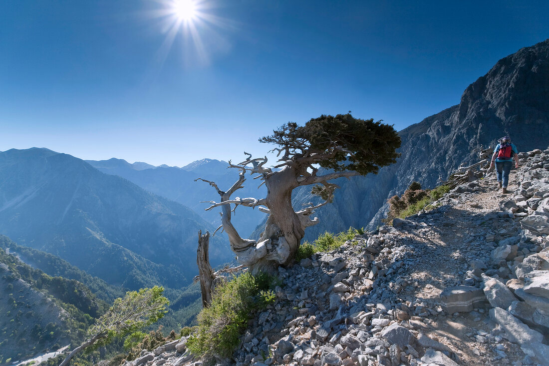 Tourists hiking on white mountains in Crete ,Greek