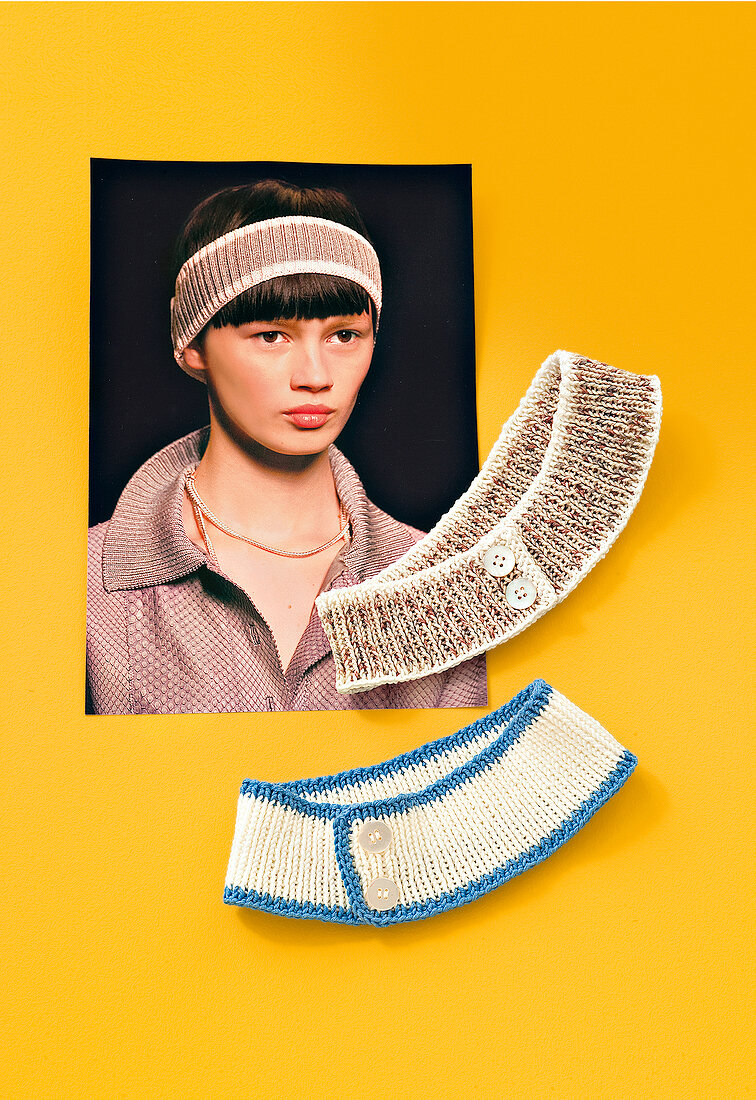 Close-up of two knitted headbands with buttons and catwalk photo on yellow background