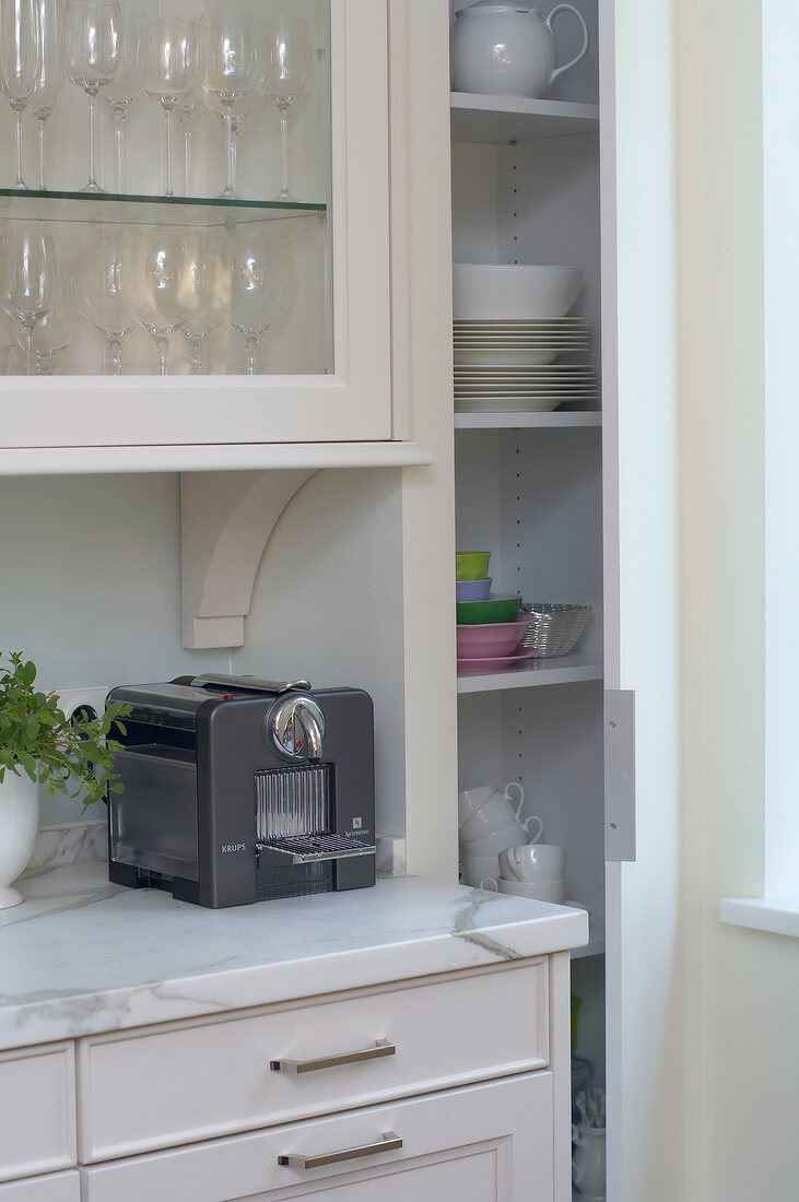 Cabinets, drawers and toaster in corner of kitchen