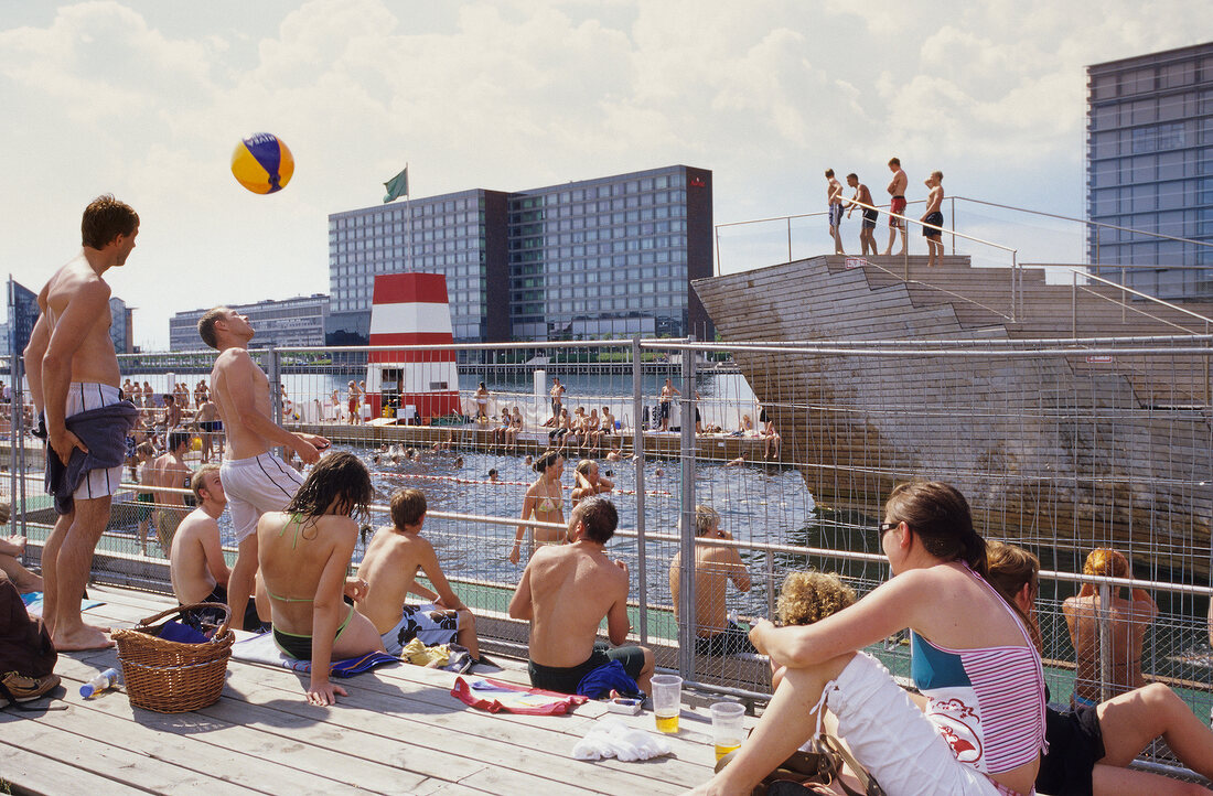 Tourists at outdoor pool in Sydhavnen, Copenhagen, Denmark