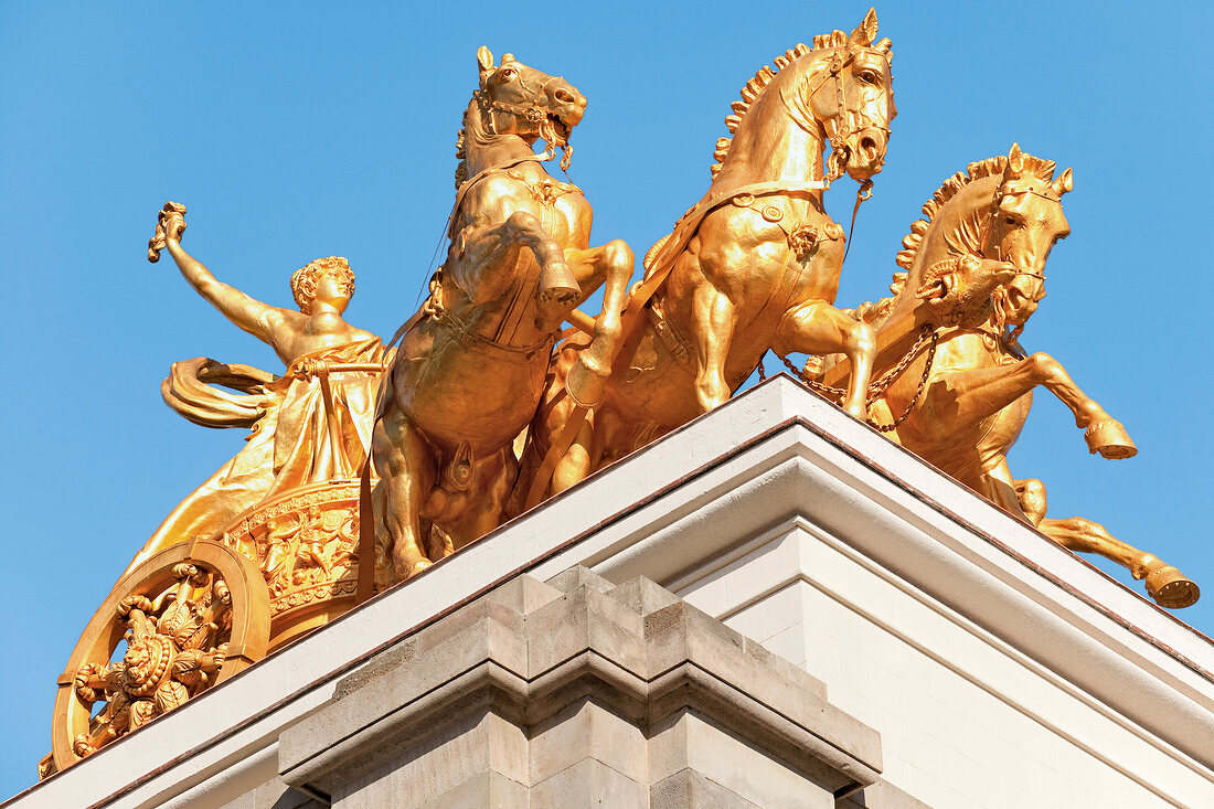 Golden chariot on Cascade Fountain with blue sky in Barcelona, Spain