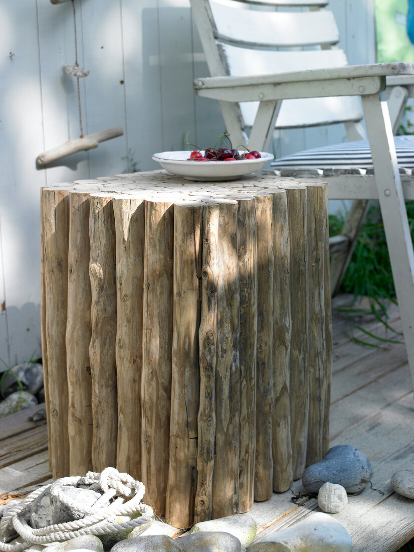 Wooden block table with pate of cherry on top