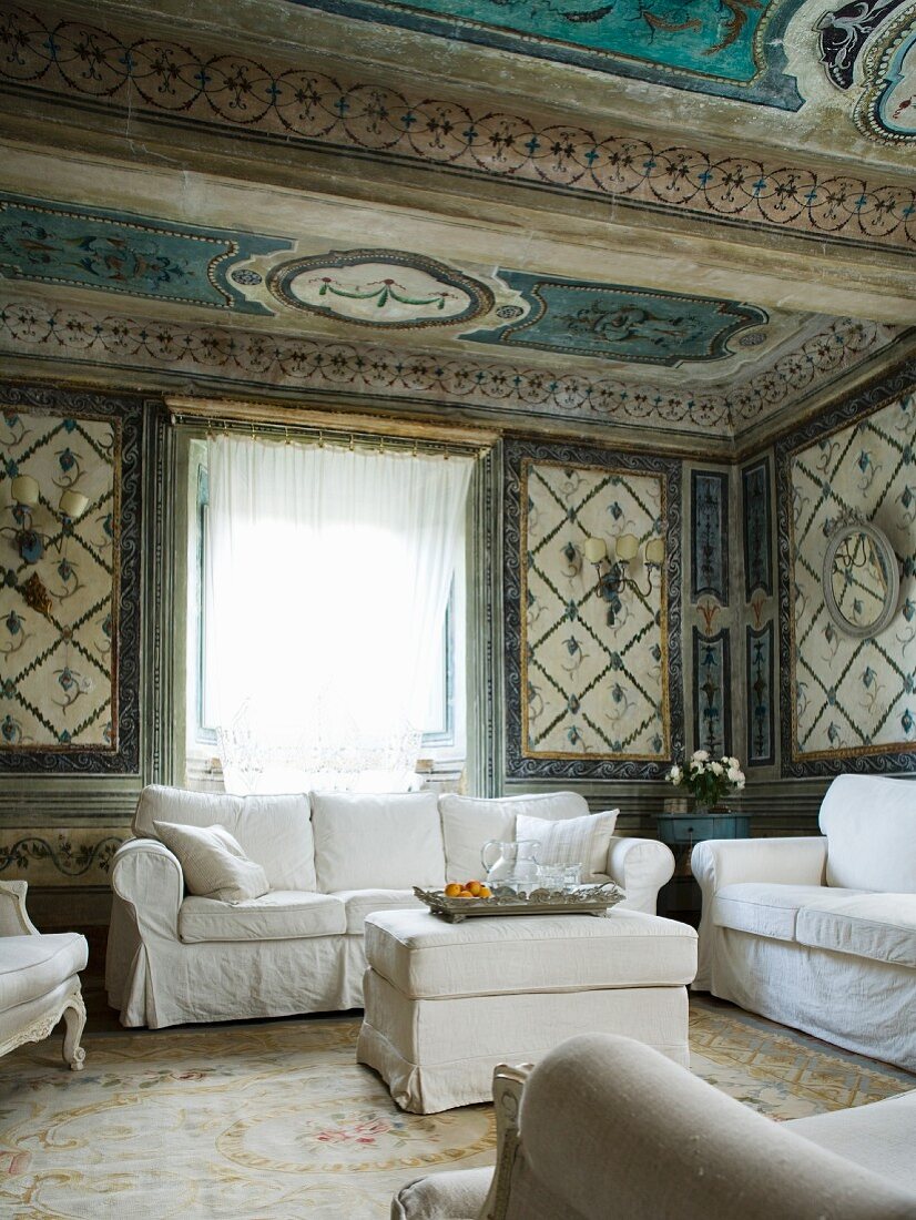 Living room with white sofa set in Italian palazzo