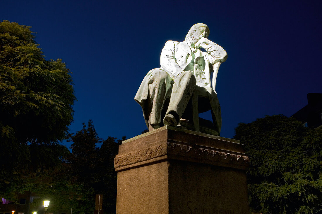 View of Zwickau Robert Schumann statue at night, Saxony, Germany