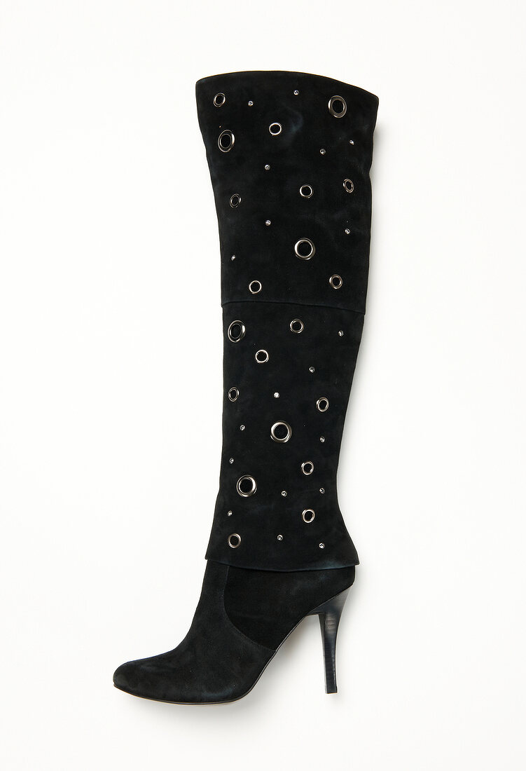 Black boots with studs and rhinestones on white background