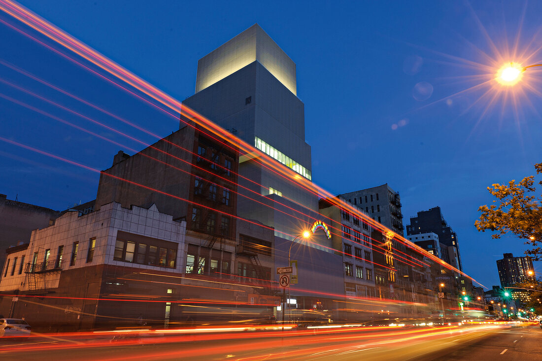 Low angle view of New Museum and street at night, Long exposure, New York, USA