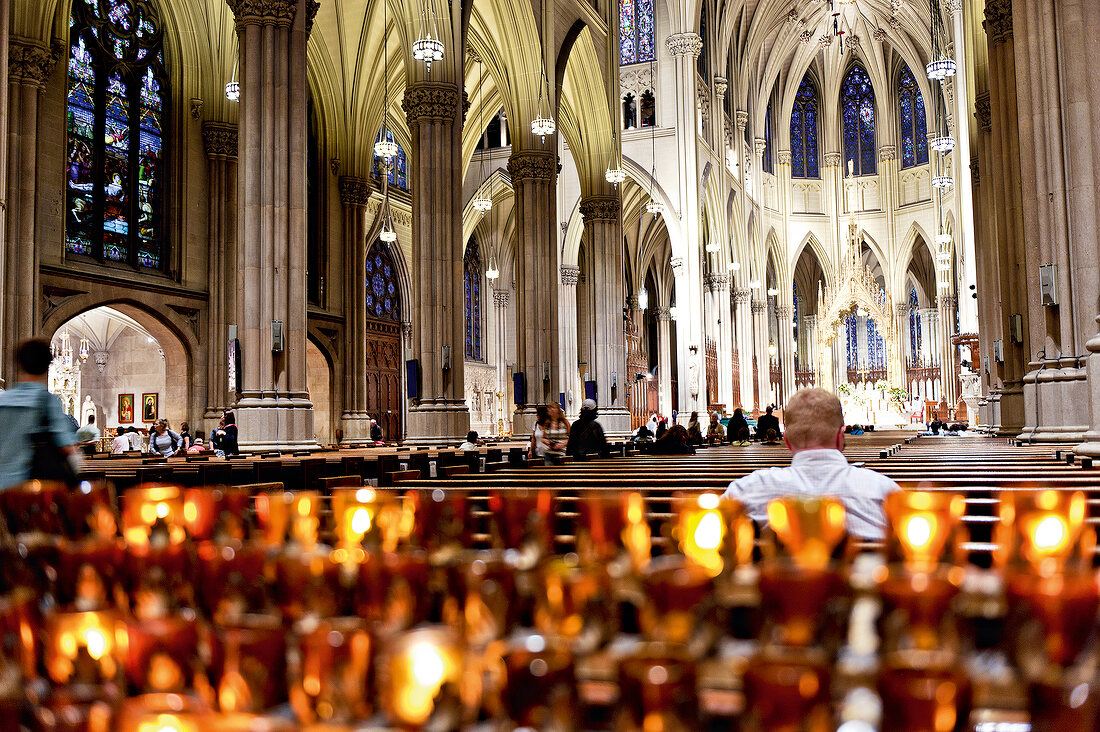 People attending mass at St. Patrick's Cathedral in Fifth Avenue, New York, USA