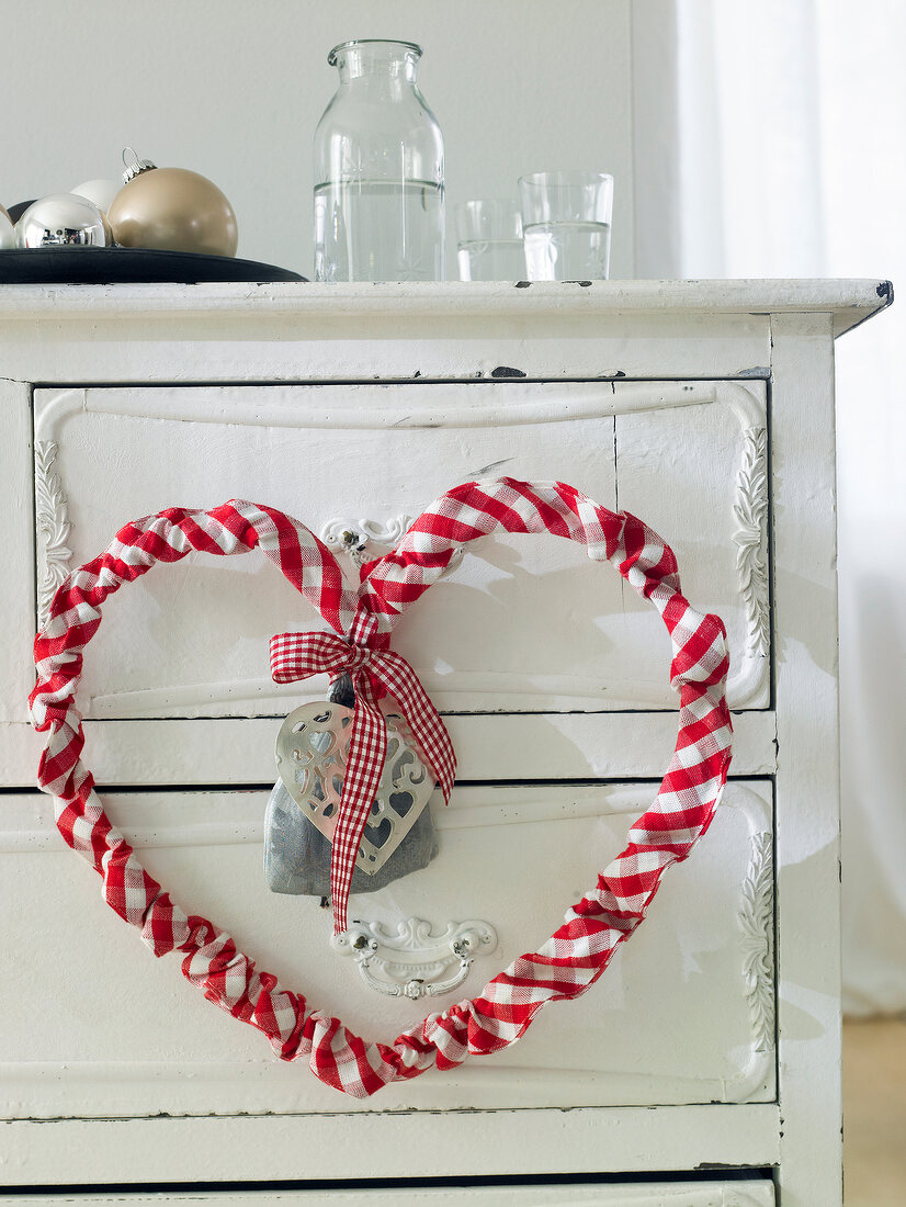 Red and white fabric heart on wire with scented bag filled with lavender