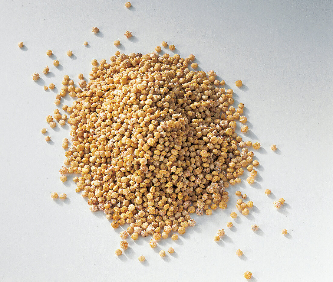 Amaranth grains on white background