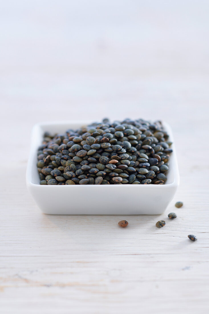 Green lentils in bowl