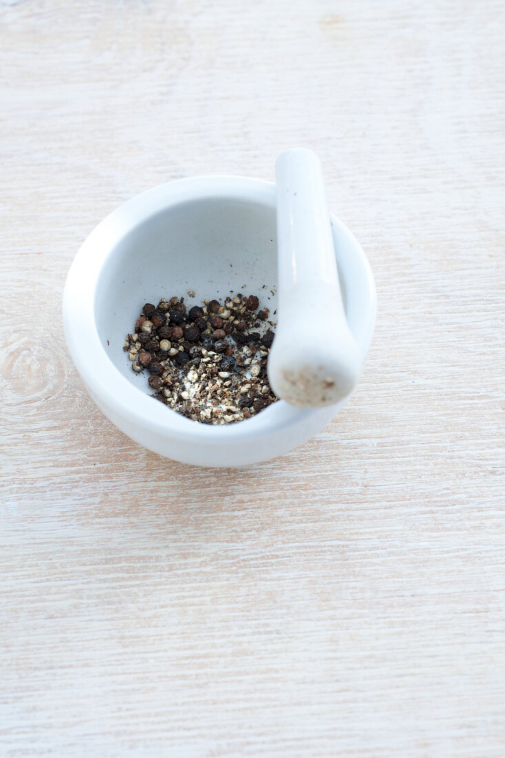Crushed pepper in mortar and pestle
