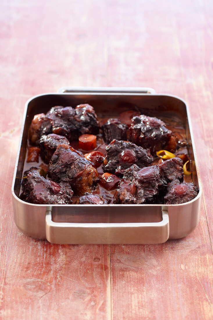 Braised oxtails in serving dish