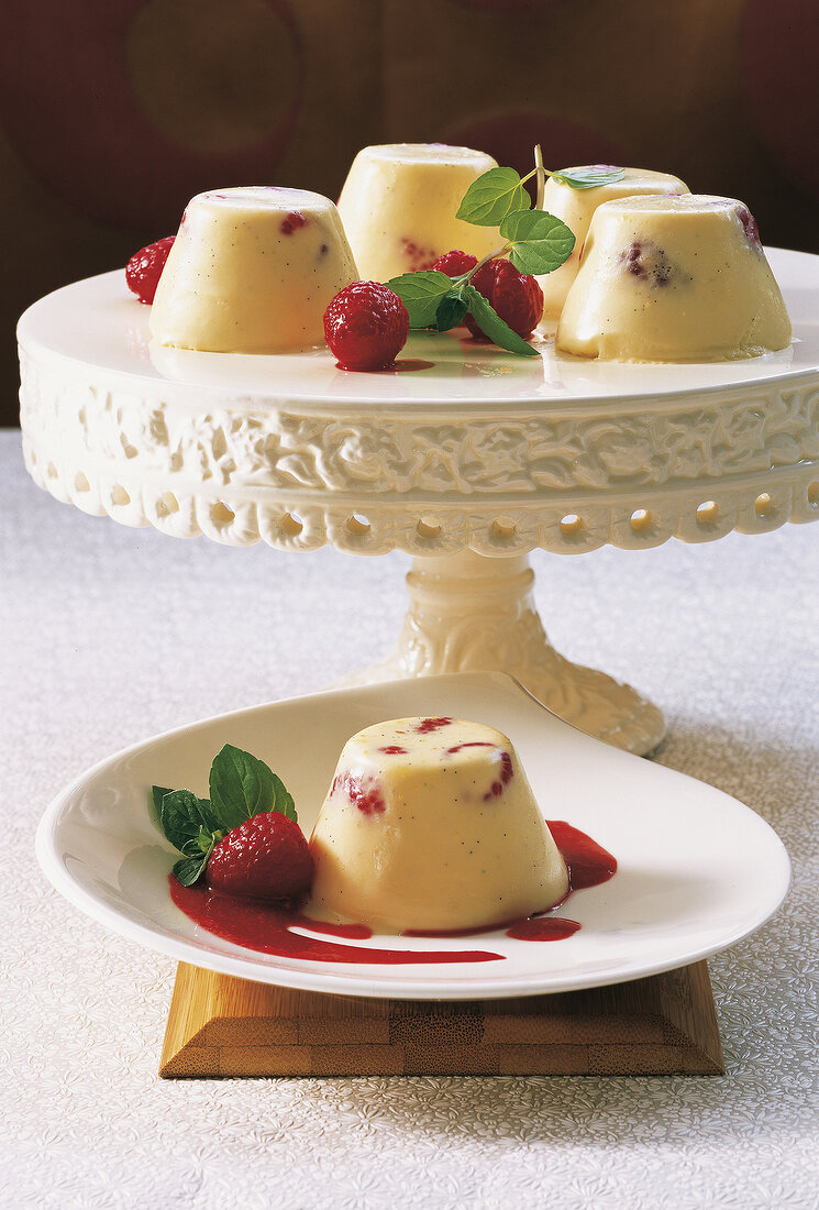 Bavarian cream with raspberries and mint in serving dish