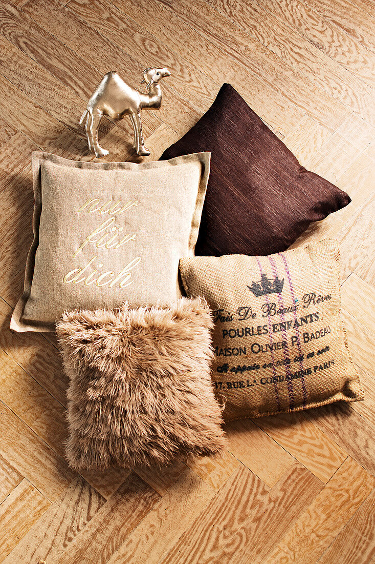 Close-up of beige and brown cushions