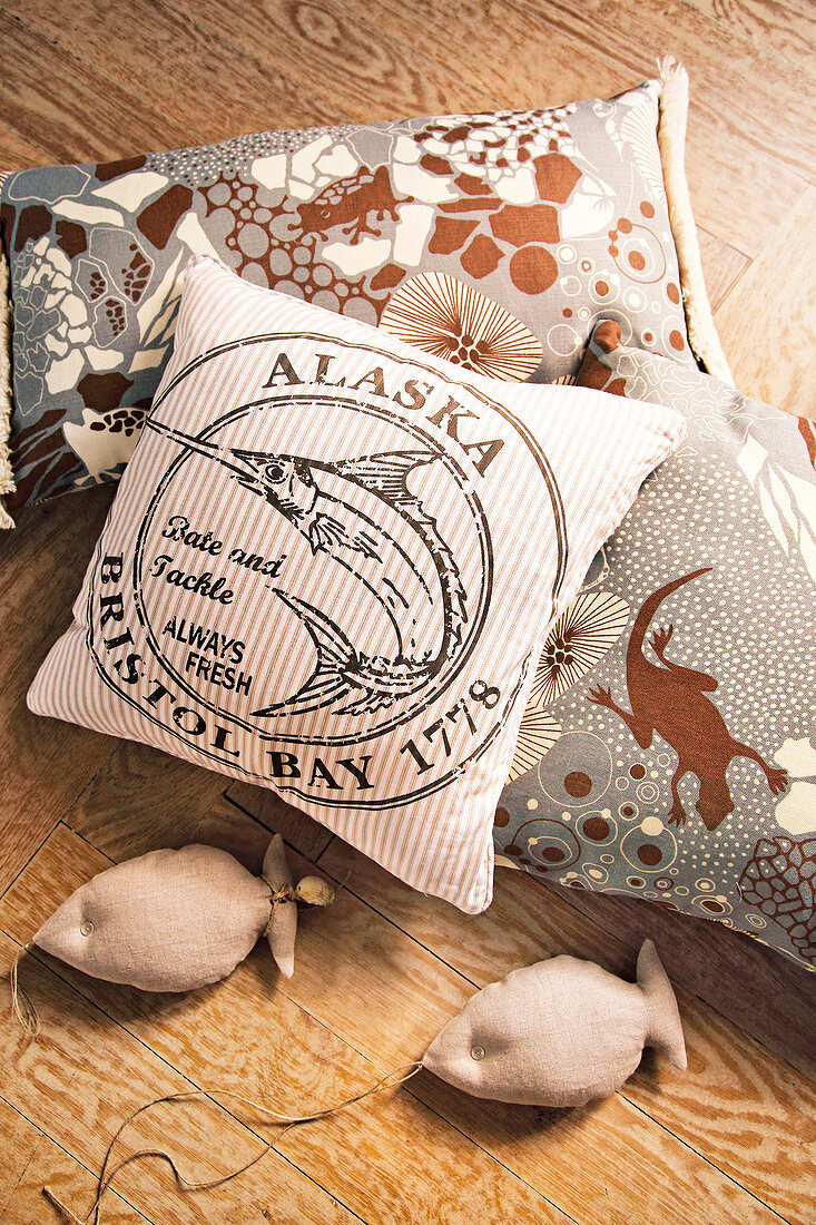 Close-up of gray and beige animal pattern pillows