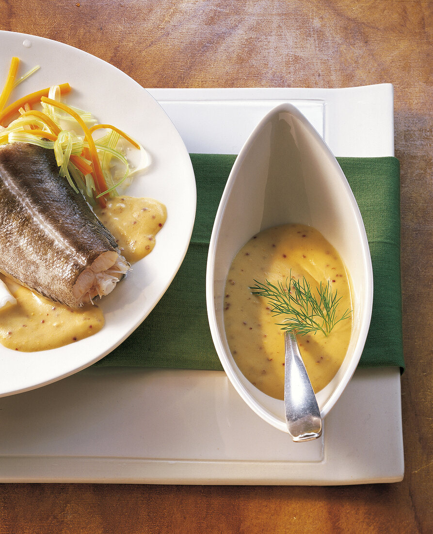 Close-up of mustard sauce for poached fish on plate, Berlin