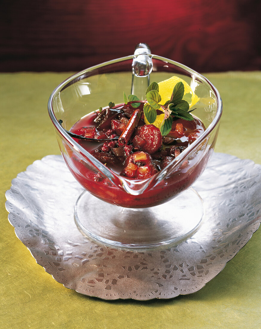 Close-up of plum and elderberry compote in bowl